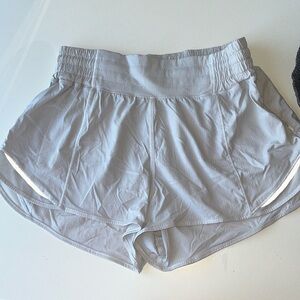 White Lululemon Hotty Hot Shorts 4” size 6